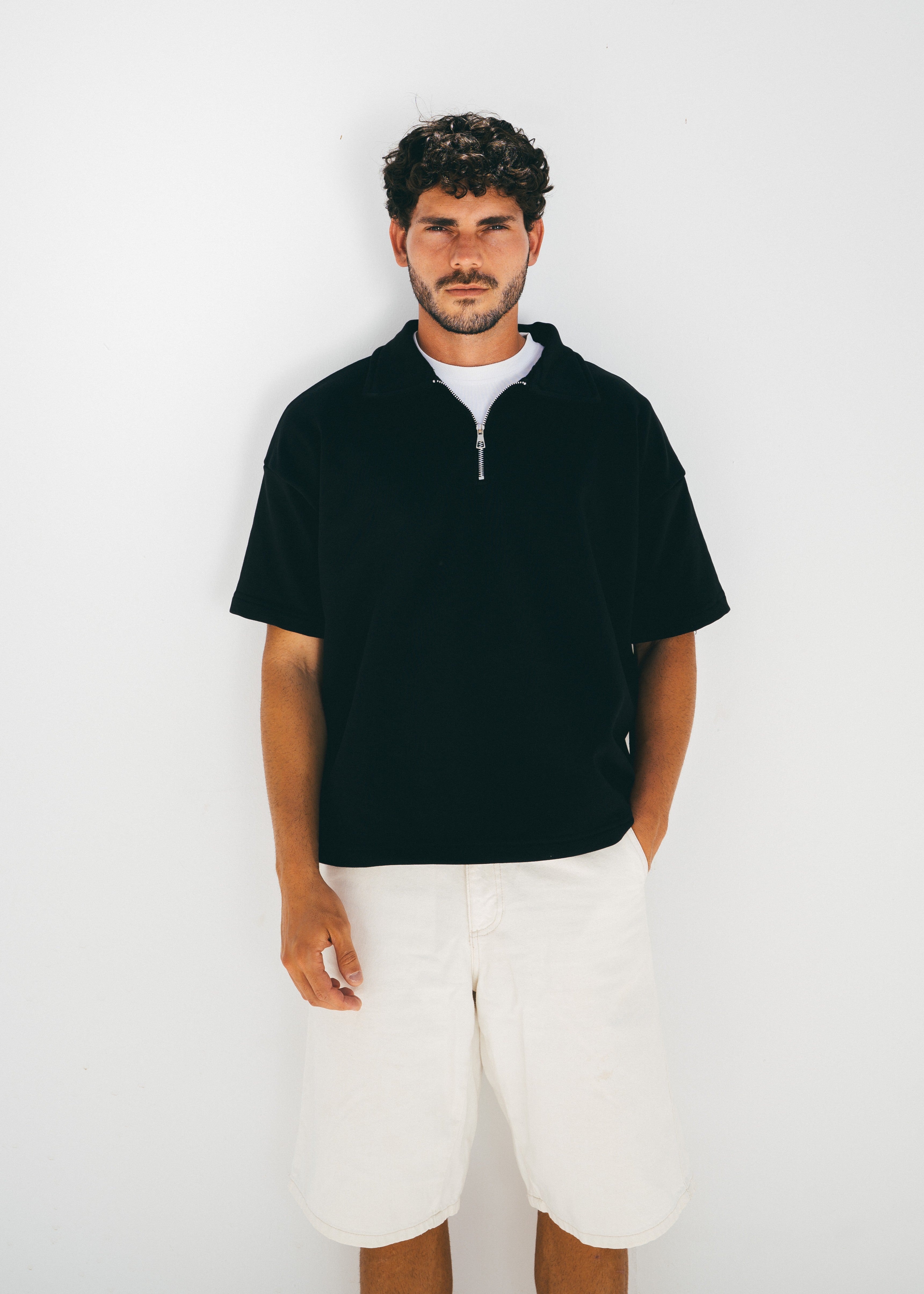 The Half Zip in Black