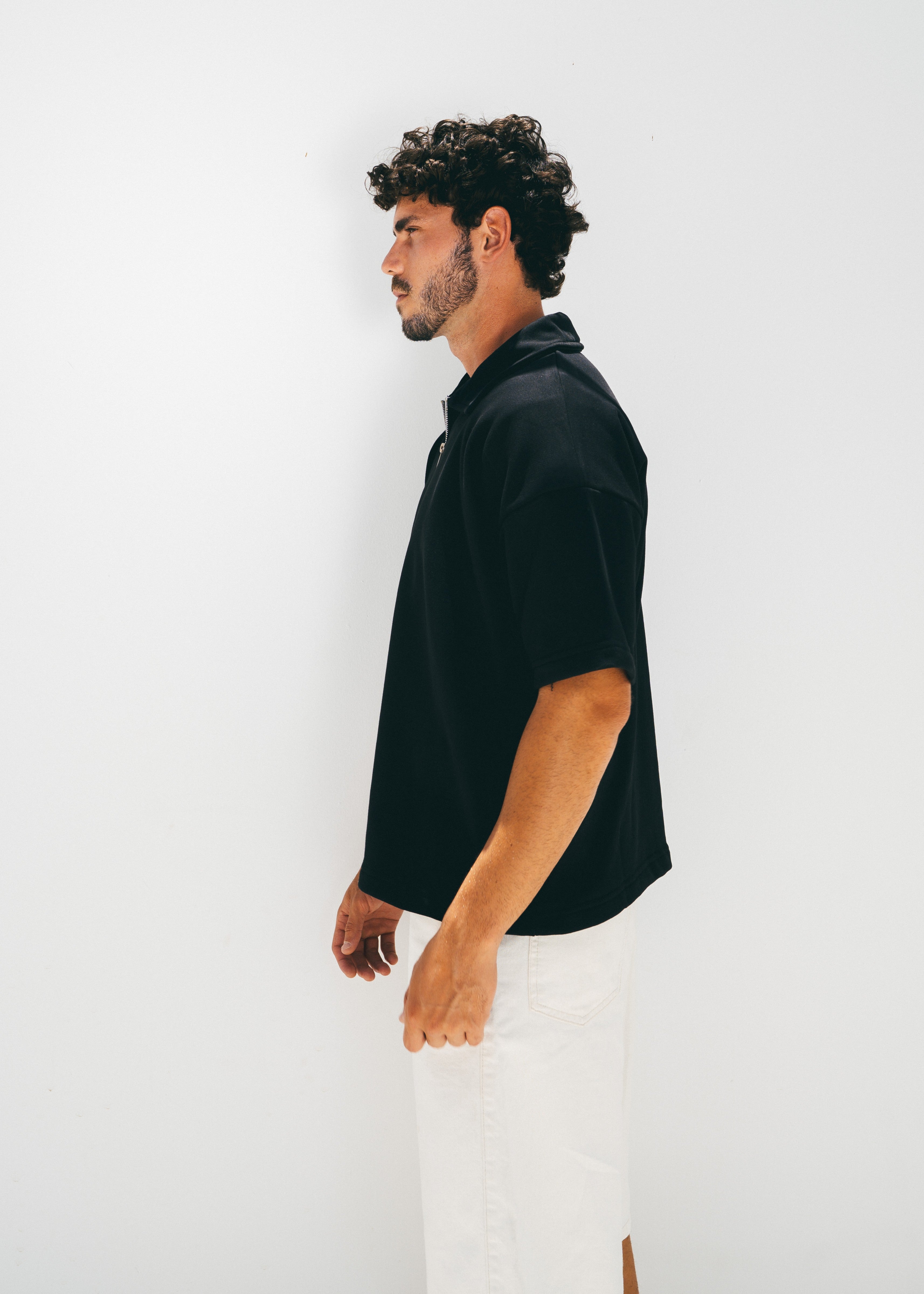 The Half Zip in Black
