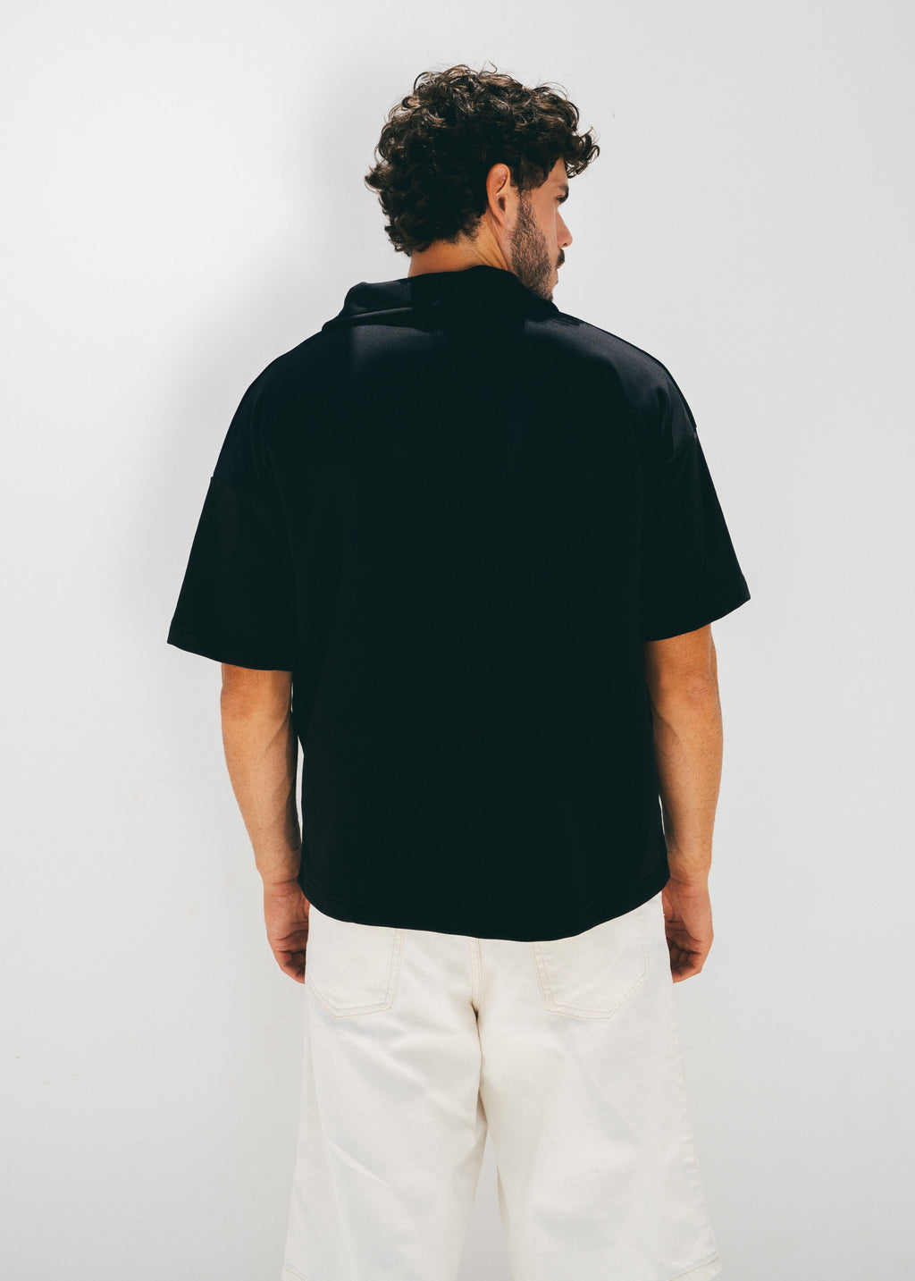 The Half Zip in Black